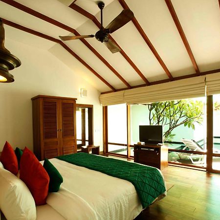 ザ ヘリテージ マドゥライ ホテル 部屋 写真 A bedroom at the resort